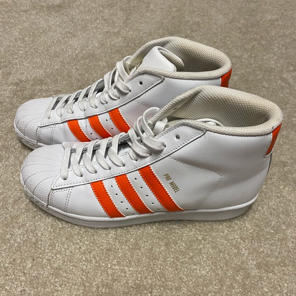 Adidas high tops. Unisex worn once